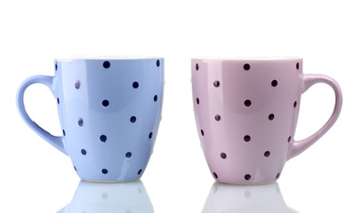 Two color cups isolated on white