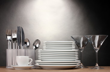 Clean plates, glasses, cup and cutlery