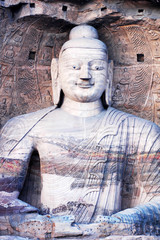 Fototapeta na wymiar Giant buddha at Yungang Grottoes in Shannxi China