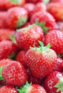 fresh ripe strawberries closeup. food background .