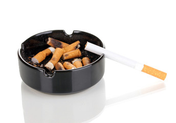 Cigarette butts in ashtray isolateed on white