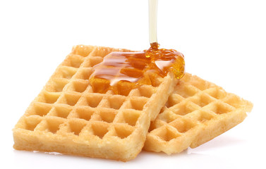 belgium waffles with honey isolated on white