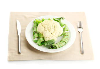 Fresh cauliflower and measuring tape