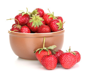 Sweet ripe strawberries in glass bowl isolated on white