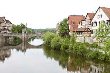 Fototapeta na wymiar historic city in germany with river and stone bridge