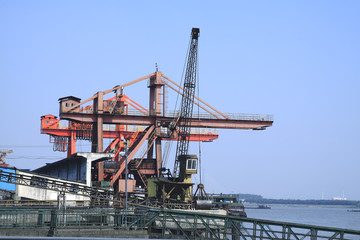 Fototapeta na wymiar The Working port crane