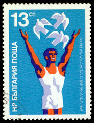 Vintage  postage stamp. Àthlete and dove.