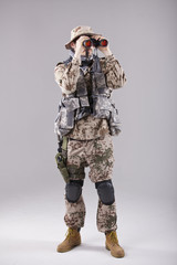 Soldier with binoculars