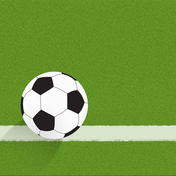 Football soccer on grass background