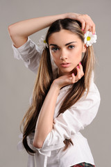 Fototapeta premium Portrait of beautiful girl on grey background