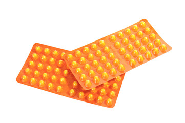 Package with yellow vitamin tablets