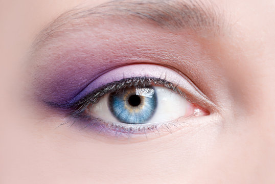 violet makeup of a female eye