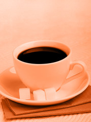 Coffee cup and sugar