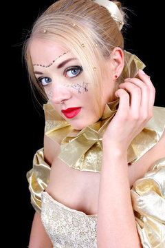 Beautiful woman with golden venetian mask