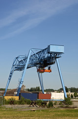Industrial crane with flat containers
