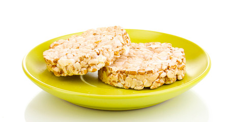 Bread snacks on saucer isolated on white