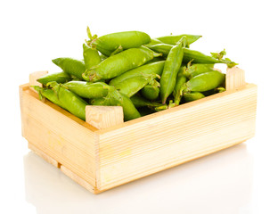 Green peas in crate isolated on white