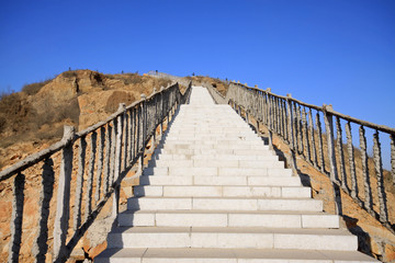 Fototapeta premium stone steps under the blue sky