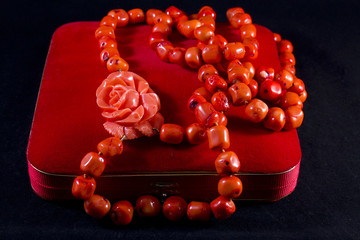 Jewelry box with a necklace of red coral © lapas77