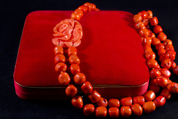 Jewelry box with a necklace of red coral