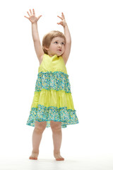 Playful baby girl dancing
