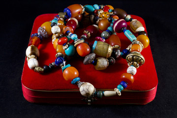 Jewelry box with necklace of precious stones