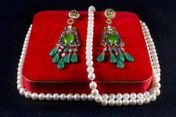 Jewelry box with a pearl necklace and earrings