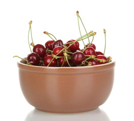 Ripe cherry berries in bowl isolated on white