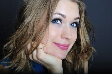 Naklejka premium bright portrait of the beautiful girl with long hair