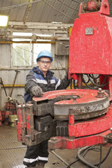 Roughneck on drilling floor