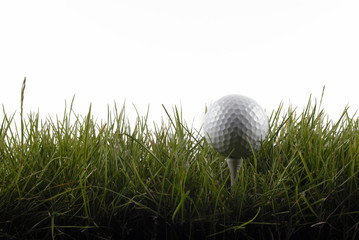 Pelota de golf y tee