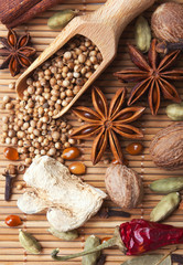 Spices and herbs over bamboo mat