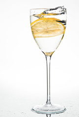Water with lemon, splash in glass