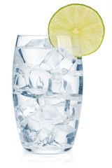 Glass of pure water with ice cubes and lime slice