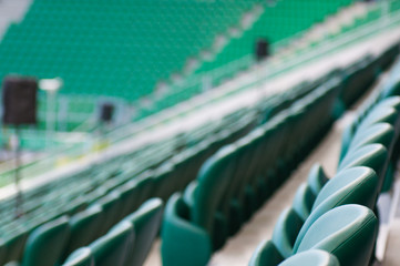 Fototapeta premium green empty seats at the stadium