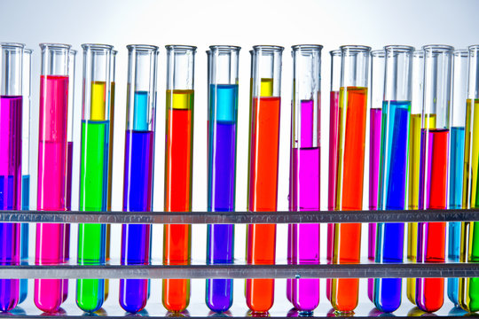 Laboratory test tubes with colored liquids inside