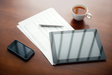Modern business workplace with digital tablet