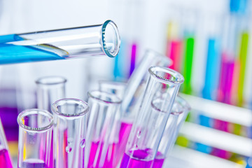 Test tubes filled with colored liquids