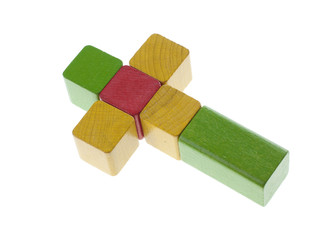 Cross concept wooden cubes