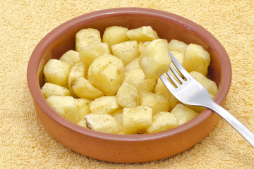 Fried pieces of potatoes
