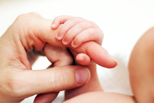 Baby Holding Finger