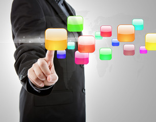 Business man pushing a button on a touch screen interface