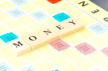 Money word on game board, business concept