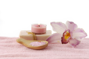Fototapeta na wymiar health spa setting on pink towel