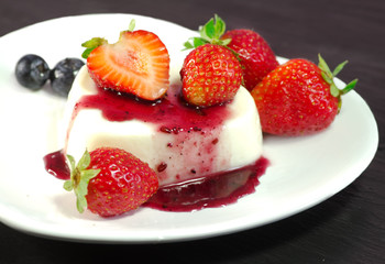 delicious panna cotta with red fruits