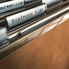 business plan folder in front of marketing folder