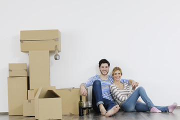 Young couple moving in new home