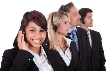 Confident business team with headsets