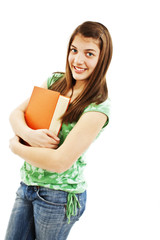 Teenage girl with a book on a white background