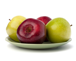 Apples pile on plate